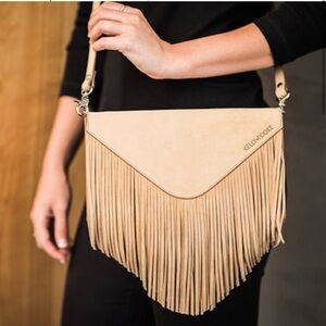 Beige suede fringe bag by Kelly Tooke who